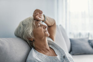 Elderly woman experiences chronic fatigue.