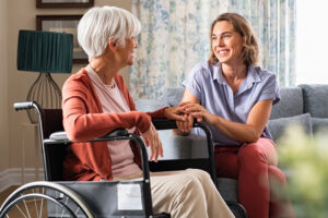handicapped-senior-talking-with-caregiver