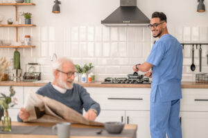 caretaker preparing breakfast for an aged man
